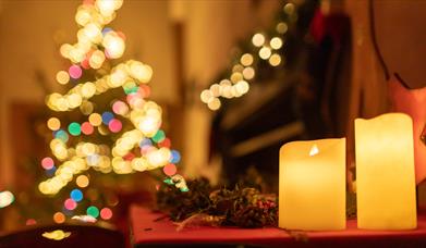 The basement kitchen softly lit by candlelight