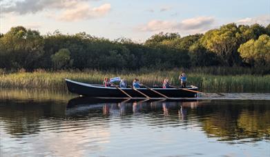A 33ft currach being rowed on Lough Erne