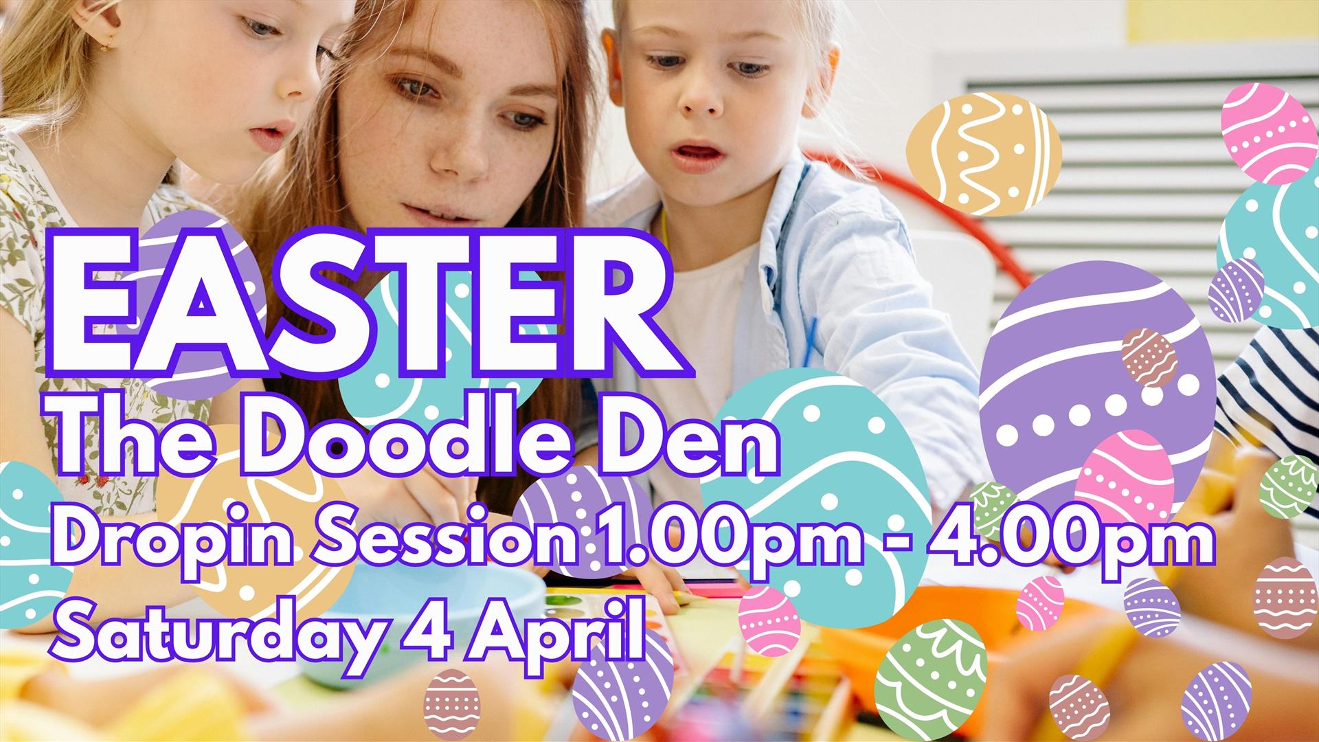 Woman and two children concentrating on craft activities