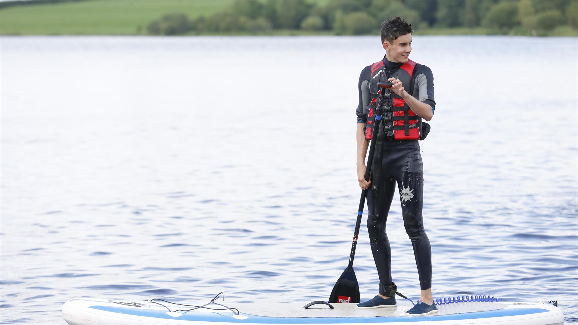 Stand Up Paddle Boarding at Share Discovery Village