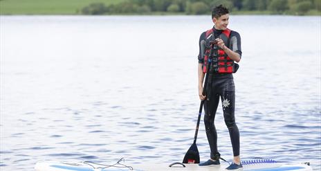 Stand Up Paddle Boarding at Share Discovery Village