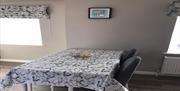 Dining Table at Cosy Nook Cottage - Seats 4 with high chair available on request.