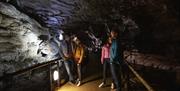 Group enjoying the underground experience of the marble arch caves