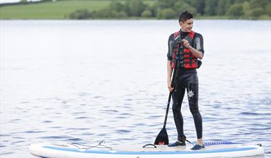 Stand Up Paddle Boarding at Share Discovery Village