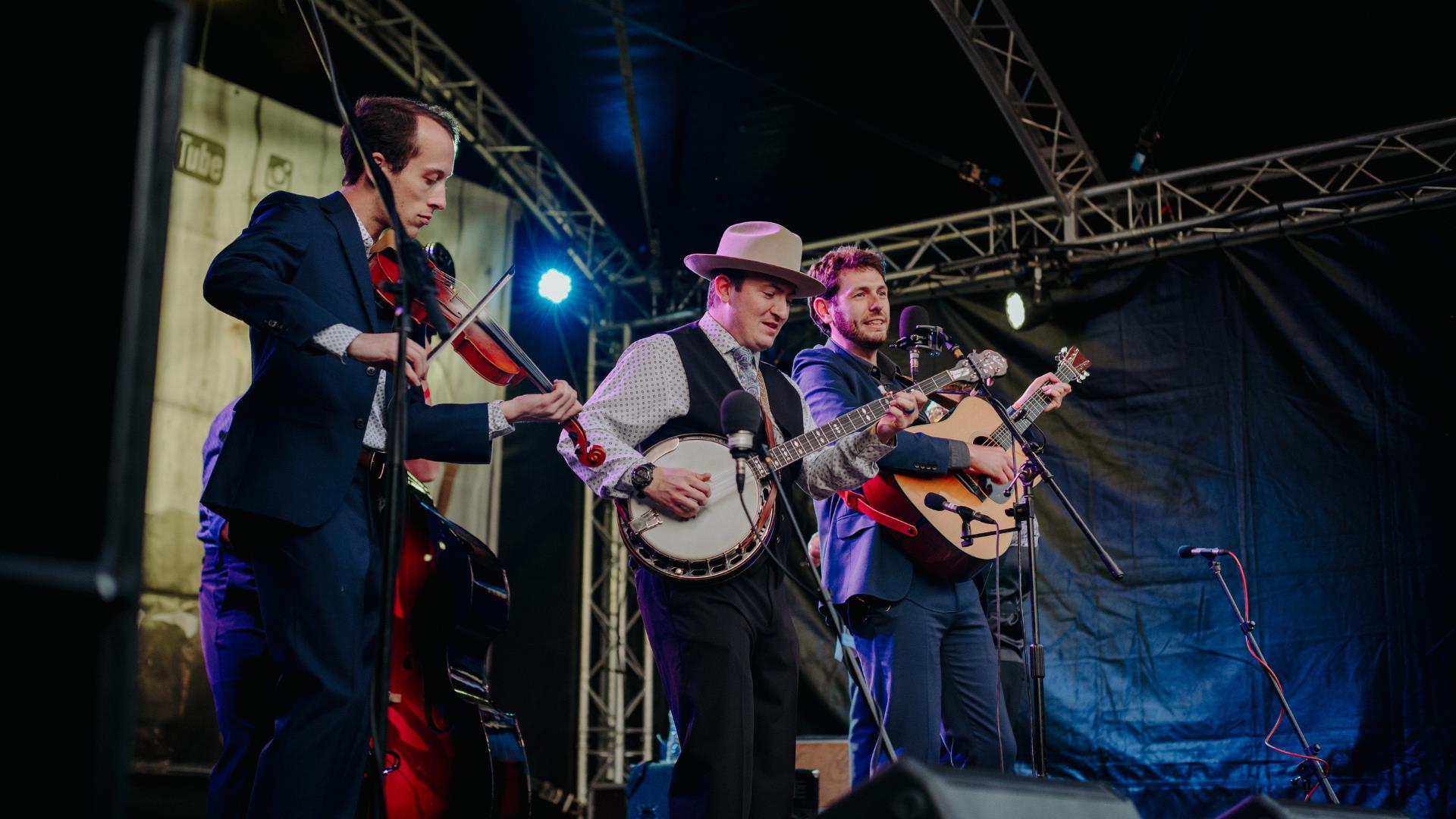 three musicians onstage at bluegrass omagh 2022