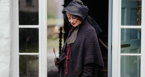 A lady dressed up for Halloween at ulster American folk park